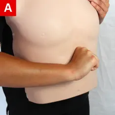 fist above the person’s navel