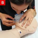 CPR Figure 16 B Give a breath for over one second and watch the chest rise