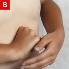 Put your fist above the person’s navel in the middle of the belly