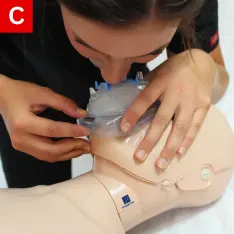 CPR Figure 21 C Give a breath for over one second and watch the chest rise